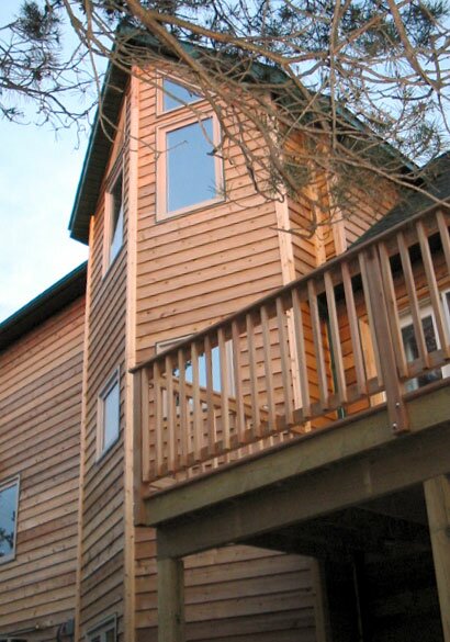 Detail image of the Mini Prow dining area as seen from outside of the model C-510 house plan.